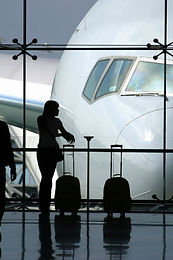 Airport traveler silhouette at terminal